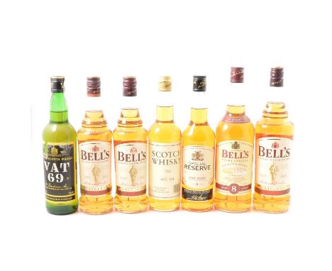 Assorted blended whiskies including:Bells - 2 x 1L, 2 x 70cl, 2 x ceramic bell decantersDimple, 1LVAT 69, 70cl, 40%three othe