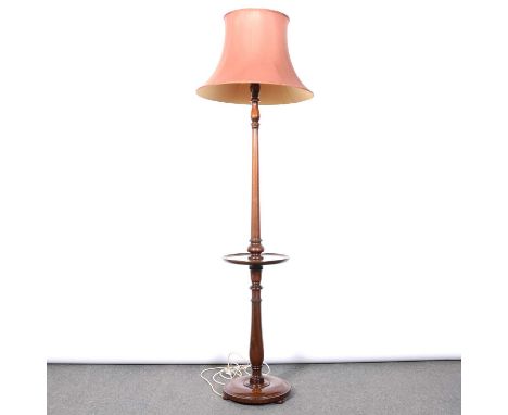 Mahogany turned standard lamp with circular tray waist fitted, with doubled lined silk shade