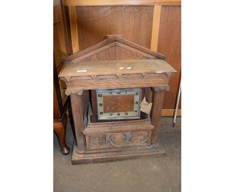 20th Century mantel clock set in a large oak architectural mount