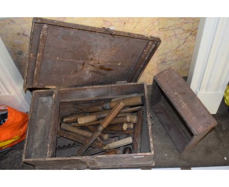 Wooden tool chest containing various assorted chisels, augers and other items