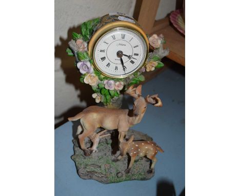 Modern mantel clock with deer decoration