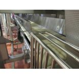 Shared flat belt conveyor approx 22 ft. L x 25 in. W with 10 in. h side splash guards, sanitary
