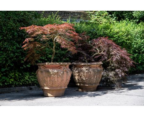 A LARGE PAIR OF TERRACOTTA PLANTERS  PROBABLY ITALIAN, LATE 20TH CENTURY  Each with scrollwork and mask relief decoration, pl