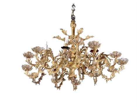 A SWEDISH OSKARIAN GILT METAL EIGHTEEN LIGHT CHANDELIER 19TH CENTURY With 18 candles, 6 modified for electric lighting, mixed
