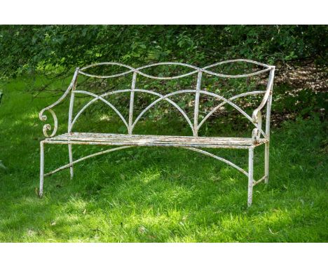 A REGENCY WROUGHT IRON GARDEN BENCH  EARLY 19TH CENTURY  174cm wide, 99cm wide   Condition Report:  With weathering - colour 