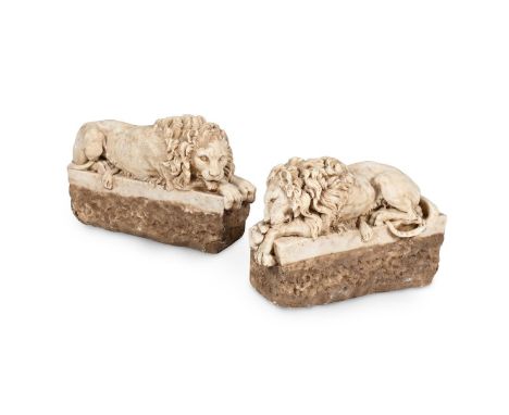 AFTER CANOVA, A PAIR OF SIMULATED MARBLE REZZONICO LIONS  OF RECENT MANUFACTURE    20.5cm high, 29cm long  Provenance:  Purch