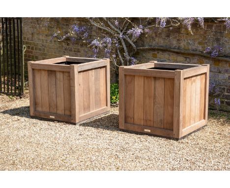 A PAIR OF HARDWOOD OXFORD PLANTERS MODERN approximately 76cm high, 76cm square  Condition Report:  Fairly modern but with Wit