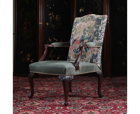 A GEORGE III CARVED MAHOGANY AND NEEDLEWORK UPHOLSTERED ARMCHAIR CIRCA 1765 The back with embroidery in wool and silk on canv