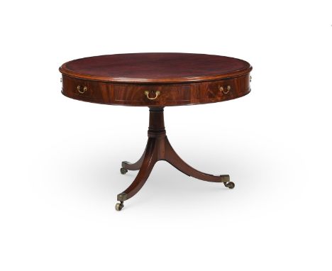 Y&nbspA GEORGE III MAHOGANY LIBRARY DRUM TABLE  CIRCA 1810  With a gilt tooled leather inset top and ebony escutcheons  73cm 