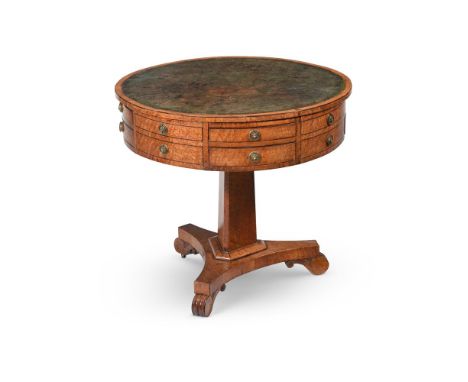 A REGENCY BIRD'S EYE MAPLE 'DRUM' LIBRARY TABLE IN THE MANNER OF GEORGE BULLOCK, CIRCA 1815 With a tooled green leather inset