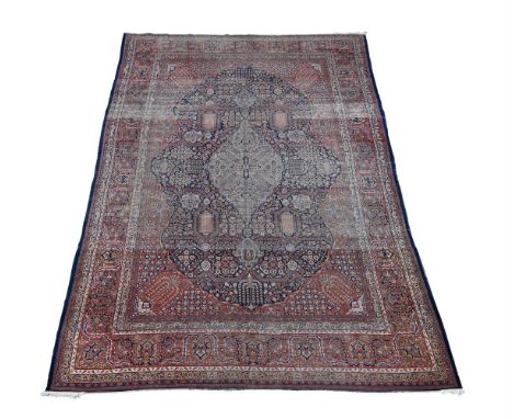 A KASHAN CARPET  approximately 470 x 299cm   Condition Report:  Carpet with wear overall. Wear reveals underlying weft in are