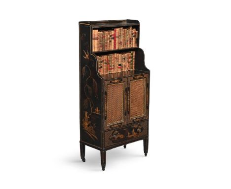 A REGENCY BLACK LACQUER AND CHINOISERIE DECORATED BOOKCASE CABINET CIRCA 1815 The doors opening to a shelved interior 133.5cm