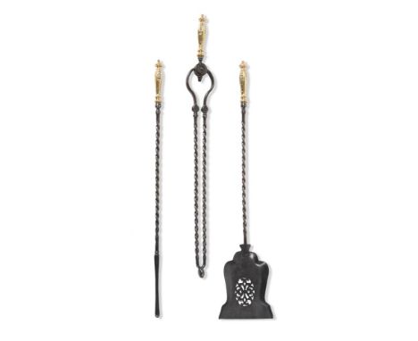 A SET OF THREE EARLY VICTORIAN BRASS AND STEEL FIRE TOOLS  MID 19TH CENTURY  With foliate clasp handles  the shovel 72cm long