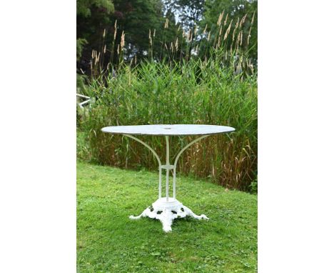 A PAINTED CAST IRON AND ZINC GARDEN OR BISTRO TABLE  BY LOUIS VUITTON, 20TH CENTURY  With 'LV' maker's mark to base  71cm hig