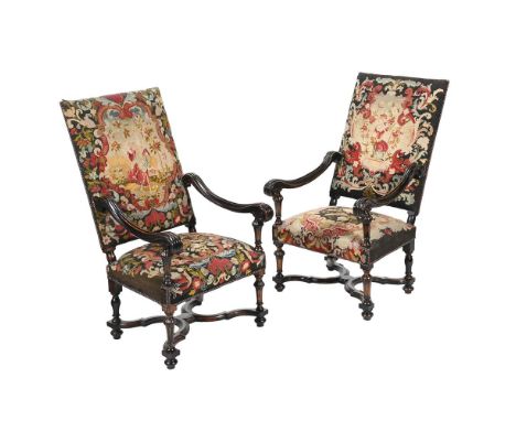 A PAIR OF EBONISED AND TAPESTRY UPHOLSTERED ARMCHAIRS IN EARLY 18TH CENTURY STYLE, EARLY 20TH CENTURY each 116cm high, 67cm w