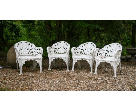 A SUITE OF CAST METAL GARDEN SEAT FURNITURE IN THE COALBROOKDALE LILY OF THE VALLEY PATTERN  LATE 20TH CENTURY  Comprising be