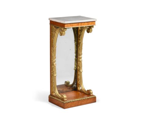 A GEORGE IV BIRD'S EYE MAPLE AND CARVED GILTWOOD CONSOLE OR HALL TABLE IN THE MANNER OF MOREL & SEDDON, CIRCA 1825 With a mar