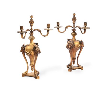 A PAIR OF GILTWOOD AND COMPOSITION TWIN LIGHT CANDELABRA IN THE MANNER OF ROBERT ADAM, 19TH CENTURY   Each with metal scrolli