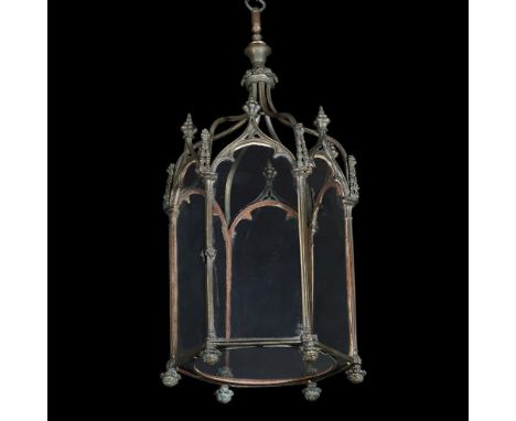 A VERDIGRIS BRONZE GOTHIC REVIVAL LANTERN   19TH CENTURY  Some traces of old gilding to the Gothic tracery framed hexagonal b