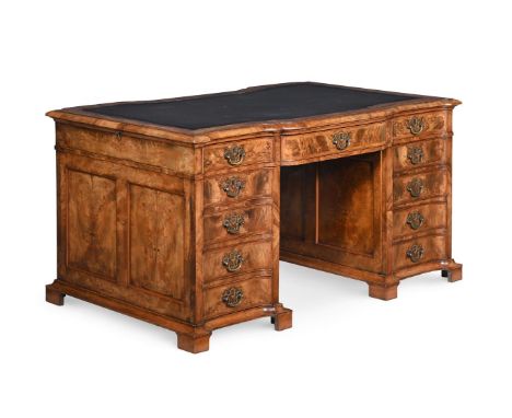 A BURR WALNUT AND CROSSBANDED PARTNER'S PEDESTAL DESK  EARLY 20TH CENTURY With tooled leather inset top, the top incorporatin