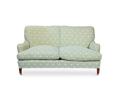 AN UPHOLSTERED SOFA  BY HOWARD CHAIRS LTD, PROBABLY LATE 20TH CENTURY   One rear left leg stamped 'HOWARD CHAIRS LTD LONDON E