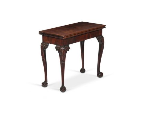 A GEORGE II MAHOGANY CONCERTINA ACTION CARD TABLE CIRCA 1750 The hinged top enclosing a velvet inset surface 72cm high, 84cm 