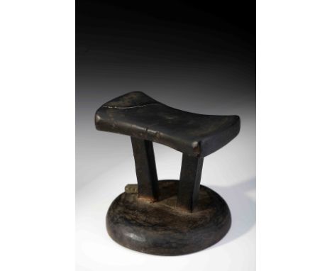A pillow, wood neck support, Angolan, 20th C. (mid), broken and glued, other minor defects, good patina wear, purchased in a 