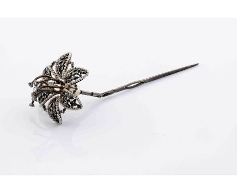 A hairpin "Flower", silver, set with seemingly natural pearls (not tested) and rose cut diamonds, 19th C., signs of use, rest