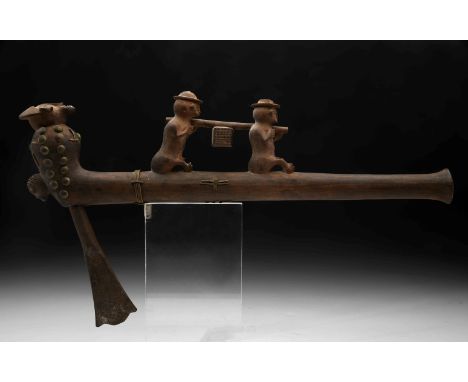 A ceremonial hatchet, wood and metals, carved decoration "Figures carrying a cage"., Angolan - Holu, 20th C. (1st half), in n