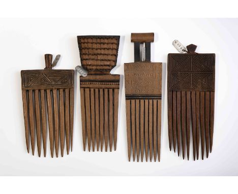 Four different combs, wood and iron, carved decoration "Geometric motifs", one of the combs with brush., Angolans - Tshokwe (