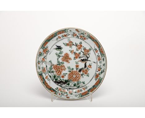 A small round dish, Chinese export porcelain, «Famille verte» polychrome decoration "Flowers and birds", back of the flap wit