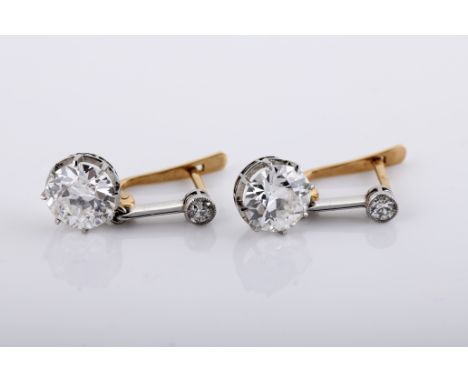 A pair of earrings, gold and platinum, set with 2 antique brilliant cut diamonds with the approximate weight of 0.20 ct. and 