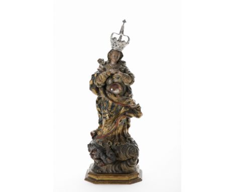 Our Lady of the Apocalypse, gilt and polychrome terracotta sculpture, womb with "Child Jesus" reliquary, gilt wooden base, si
