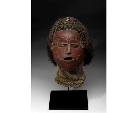 A «Mwana Pwo» Mask, wood, fibers, cotton, beads and pigments, mask representing the ideal of female beauty, used by professio