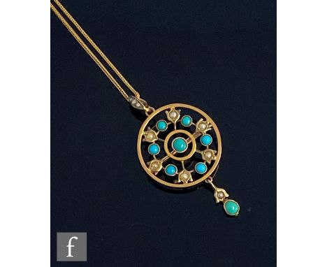 An early 20th Century 9ct seed pearl and turquoise circular open work pendant, length 4.5cm, suspended form a 15ct fine trace
