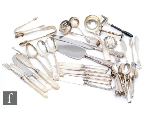 A parcel lot of assorted hallmarked silver flatware to include tea and dessert spoons, a meat skewer, shifting spoons, mother