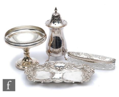 Four items of hallmarked silver to include a sugar castor, a small pedestal dish, a silver topped glass trinket box and a sma