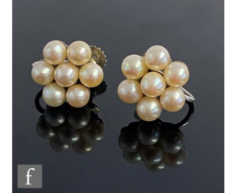 A pair of 9ct white gold, cultured pearl cluster screw fitting stud earrings, each comprising seven pearls, weight 4g, diamet