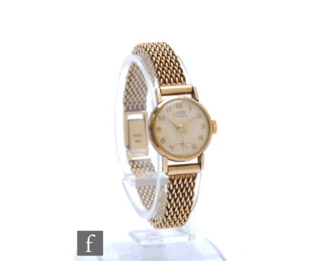 A 9ct hallmarked lady's Uno manual wind wristwatch, Arabic numerals to a cream dial, case diameter 18mm, to a 9ct hallmarked 