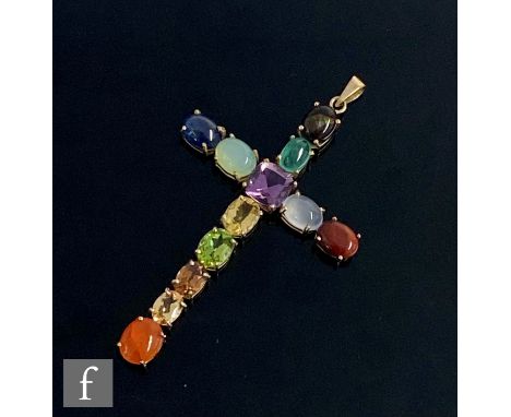 A 9ct hallmarked multi stone set cross with claw set amethyst, citrene, peridot, golden beryl and assorted other stones, weig