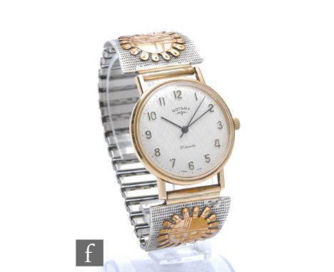 A gentleman's 9ct Rotary manual wind wristwatch, Arabic numerals to a textured silvered dial, case diameter 34mm, total weigh