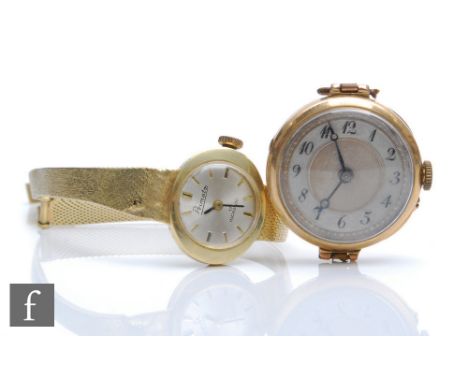 A lady's 14ct Primto manual wind wristwatch, gilt batons to a circular silvered dial, case diameter 16mm, to an integral 14ct