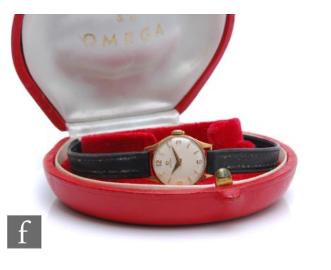 A lady's 9ct hallmarked Omega, manual wind wristwatch, Arabic numerals and batons mix to a white dial, case diameter 20mm, al