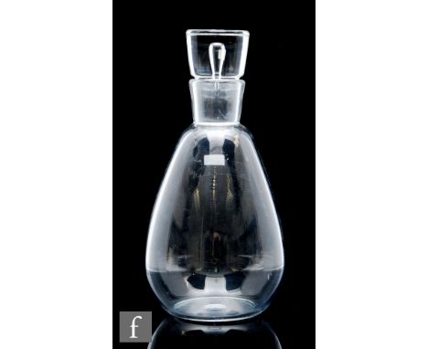 A 1950s Steuben glass decanter designed by George Thompson, of ovoid form with tapering drum form stopper with internal tear,