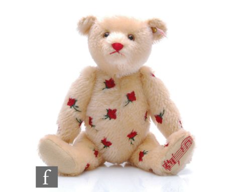 A Steiff 663017 Musical Bear Jerusalem, blond mohair with embroidered roses, limited edition 246 of 2000, height 30cm, boxed 