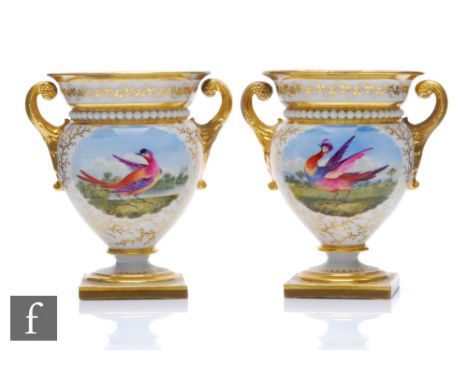 A mirrored pair of 19th Century Flight Barr and Barr Worcester twin handled vases each decorated with a ho ho bird against a 