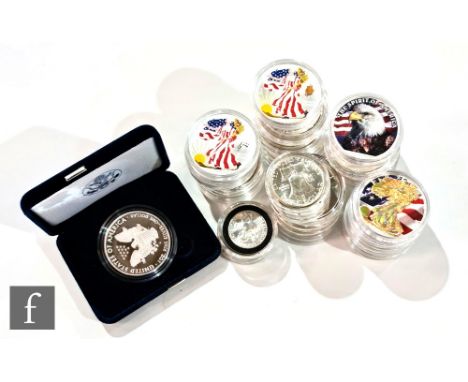 Twenty seven modern American silver one ounce enamel back dollars including a cased dollar and twelve nickel dollars, also va