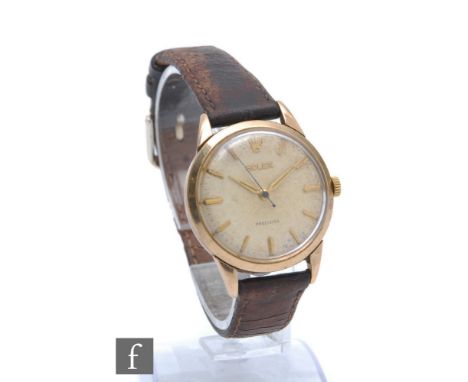 A gentleman's 9ct hallmarked Rolex manual wind wristwatch, batons to a circular cream dial, case diameter 32mm, all to a brow