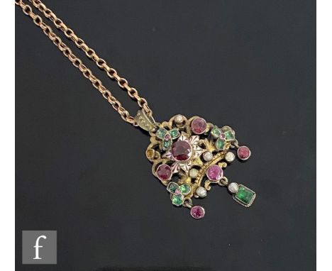 A 19th Century Austro-Hungarian white metal multi stone and enamel decorated pendant set with garnet, amethyst and green ston