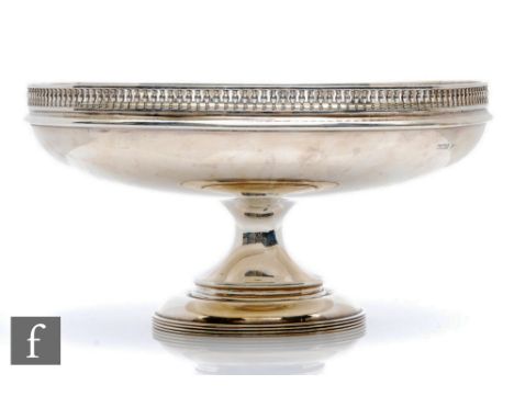 A hallmarked silver pedestal bowl, circular stepped foot supporting plain bowl terminating in pierced gallery, weight 20.5oz,